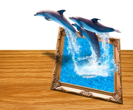 Magic photo frame with three dolphins jump の写真素材