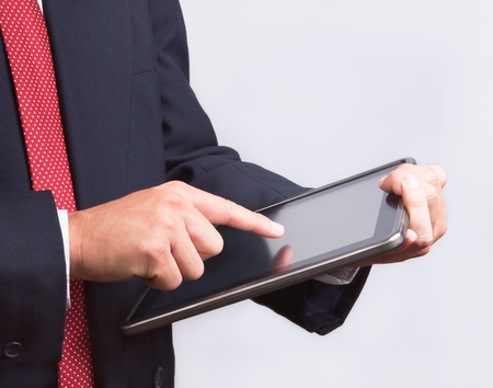 business man touching tablet pc , New Technologyの写真素材