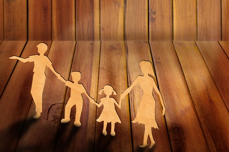 Warmth family concept, make for cut out of paper on wood textureの写真素材