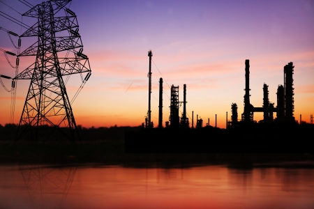 High voltage pose with petrochemical oil refinery plant の写真素材