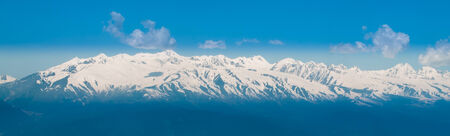 Panorama of Snow Mountain Range Landscape with Blue Skyの写真素材