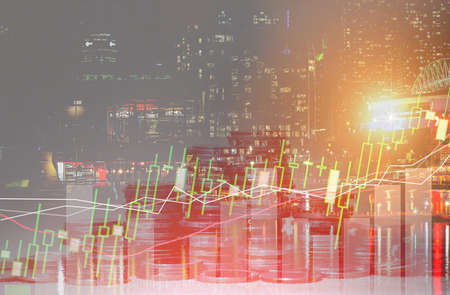 Double exposure of city and rows of coins for money, finance and business concept of teamwork and...