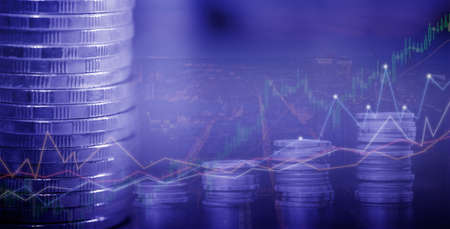 Financial investment concept, Double exposure of city night and stack of coins for finance investor,...