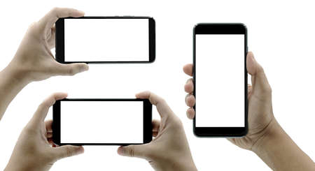 Woman hand holding the black smartphone with blank screen and modern frameless design two positions angled and vertical - isolated on white backgroundの写真素材