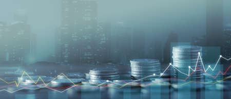Financial investment concept, Double exposure of city night and stack of coins for finance investor, Forex trading candlestick chart economic, ECN Digital economy, business, money, passive income.の写真素材