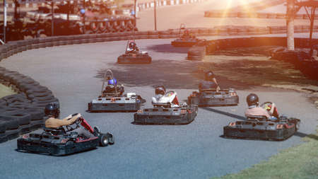Go kart speed drive race sport contest, A driver in gear and helmet drives a racing car. In action, fun entertainment for drivers. Soft light glow, copy space.の写真素材