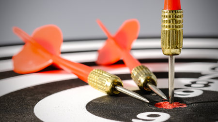 Goals concept - Smart goal setting, red three darts arrows in the target center business goal...
