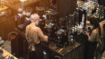 Bangkok, Thailand - November 9, 2021 : Coffee shop bar cafe Restaurant, Barista Prepare Coffee...