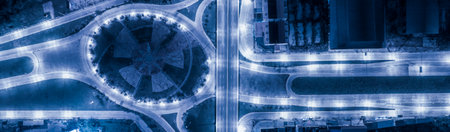 Expressway top view, Road traffic an important infrastructure, Drone aerial view fly in circle, traffic transportation, Public transport or commuter city life concept of economic and energ, transport.の写真素材