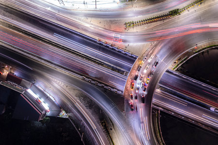 Expressway top view, Road traffic an important infrastructure, Drone aerial view fly in circle,...
