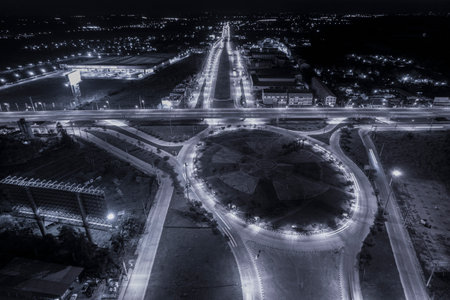 Expressway top view, Road traffic an important infrastructure, Drone aerial view fly in circle, traffic transportation, Public transport or commuter city life concept of economic and energ, transport.の写真素材