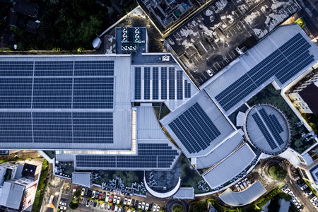 Solar roof, Solar on the roof, top view worker installing a solar cell on the factory roof, panels...