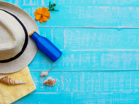 Summer concept. Summer accessories and sea shells on wooden background.の写真素材