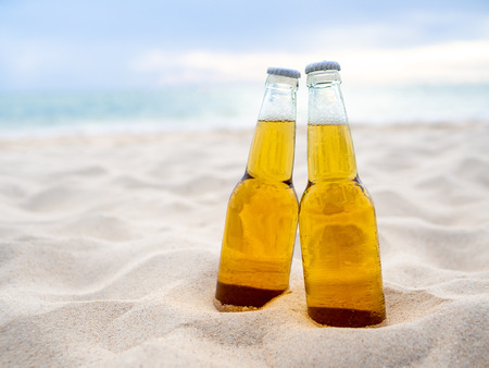 Bottles of Beer on the beach. Party, Friendship, Beer Concept.の写真素材