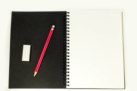 Drawing book laid bare a pencil eraser were placed ontoの写真素材