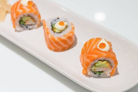 roll sushi with salmon In white plateの写真素材