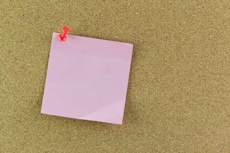 blank note paper on cork board background