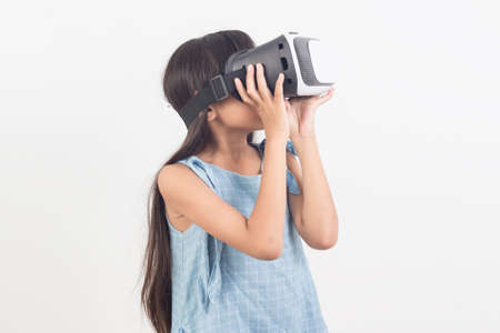 little girl  playing video games virtual reality glasses