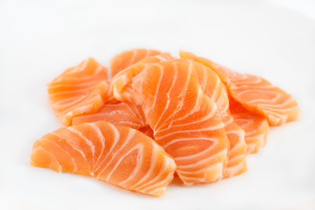Salmon raw sashimi on white backgroundの写真素材