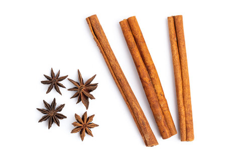 anise star and cinnamon stick isolated on white backgroundの写真素材