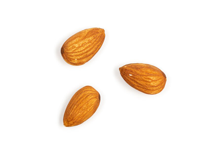 Top view Almonds isolated on white backgroundの写真素材