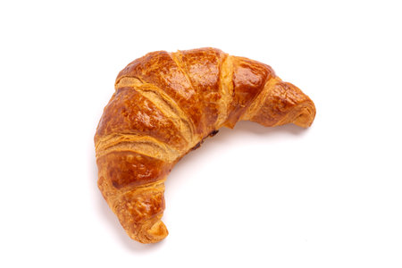Delicious fresh croissant isolated on white backgroundの写真素材