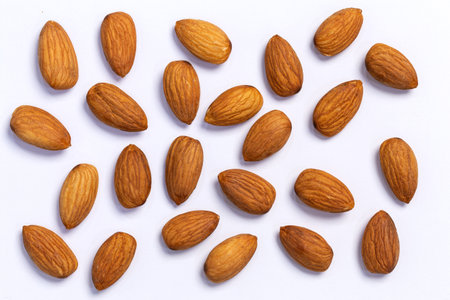 Almonds isolated on white backgroundの写真素材