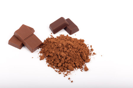 cocoa powder and chocolate bars  isolated on white backgroundの写真素材