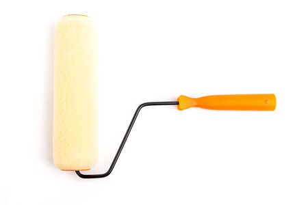 Top view Roller paint brush on isolated white backgroundの写真素材