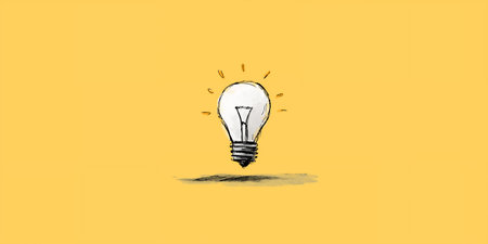 Illustration of a lightbulb on a yellow background with space for textの素材