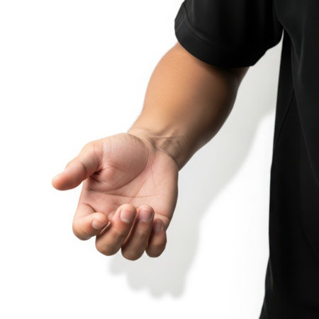 A detailed view of a human hand extended with palm facing upwards, showcasing skin texture and wrist.の素材