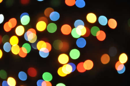 Abstract celebration background with sparkling multicolor circles