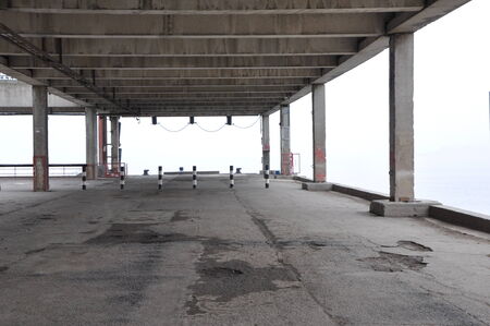 Empty passenger berth against misty river in deep autumnの写真素材