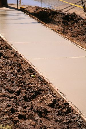 Freshly Layed Sidewalk Cemement Workの写真素材