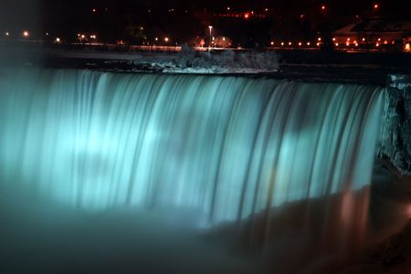 Niagara Horse Shoe Falls at Night with Blue Lightsの写真素材