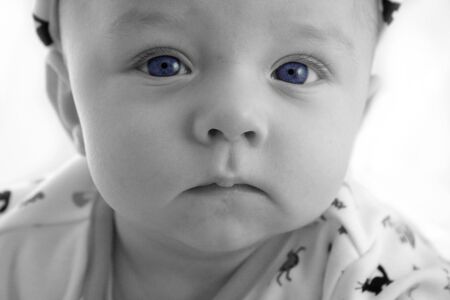 Baby Boy with Serious Face - Age 3 to 6 Monthsの写真素材