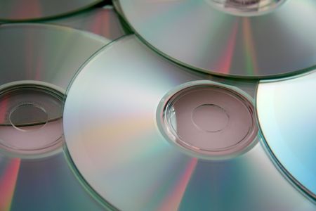 Colorful Circular Compact Discs with light Reflection