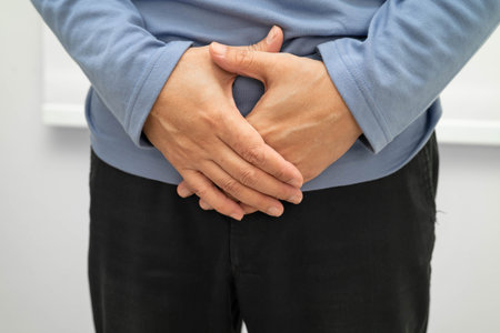 Hernia, Asian man stomach ache, abdominal pain and urology problem health.の写真素材