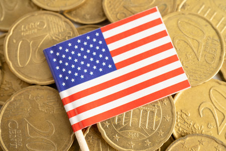 US flag on coin and banknote money, finance trading investment business currency.