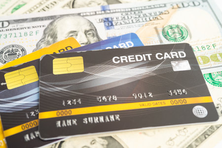 Credit card on US dollar banknotes, finance economy trading shopping online business.の写真素材