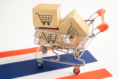 Thailand shopping, Shopping cart box on flag, import export, finance commerce.の写真素材