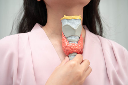 Hyperthyroidism, Overactive Thyroid, Thyroid Lymphoma, Asian woman with thyroid gland human anatomy...