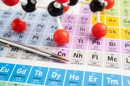 Molecules chemical on a periodic table background.の写真素材