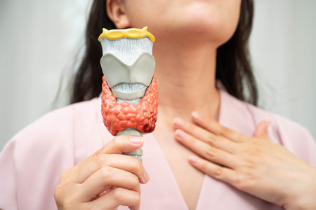 Hyperthyroidism, Overactive Thyroid, Thyroid Lymphoma, Asian woman with thyroid gland human anatomy...