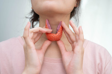 Hyperthyroidism, Overactive Thyroid, Thyroid Lymphoma, Asian woman with thyroid gland human anatomy...