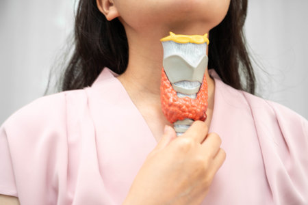 Hyperthyroidism, Overactive Thyroid, Thyroid Lymphoma, Asian woman with thyroid gland human anatomy...