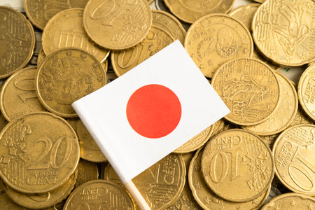 Japan flag on coin and banknote money, finance trading investment business currency.の写真素材
