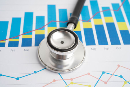 Stethoscope on chart or graph paper, Financial, statistics and business data.の写真素材