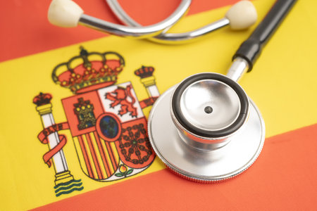 Spain flag with black stethoscope.の写真素材