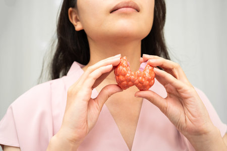 Hyperthyroidism, Overactive Thyroid, Thyroid Lymphoma, Asian woman with thyroid gland human anatomy...